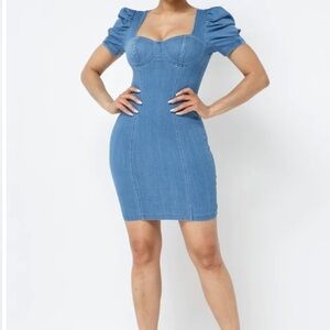 Puff sleeve denim midi. Medium stretch solid color. Cuff bust. Medium.